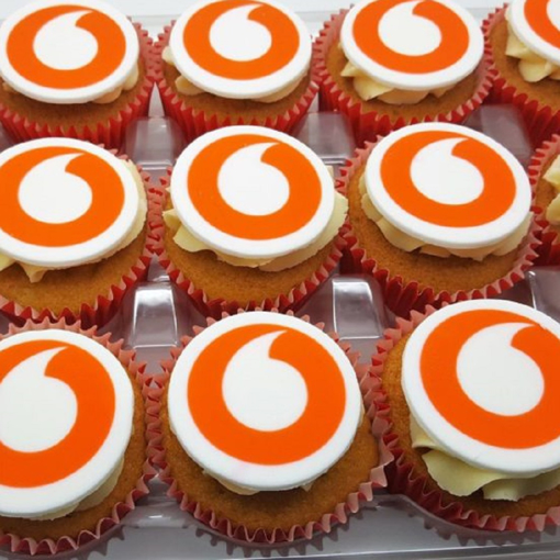 3 rows of branded frosted cupcakes