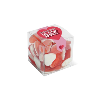 A clear cube filled with haribo heart shaped sweets