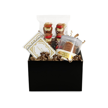 a black promotional hamper containing 3 chocolate items
