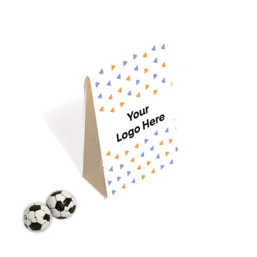 cardboard box printed with company logo filled with chocolate footballs